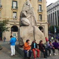sculptures and lots of people around Plaza des Armas