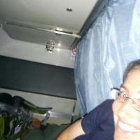 This happy. Probably better for short people! The lower bunk is slightly wider. 